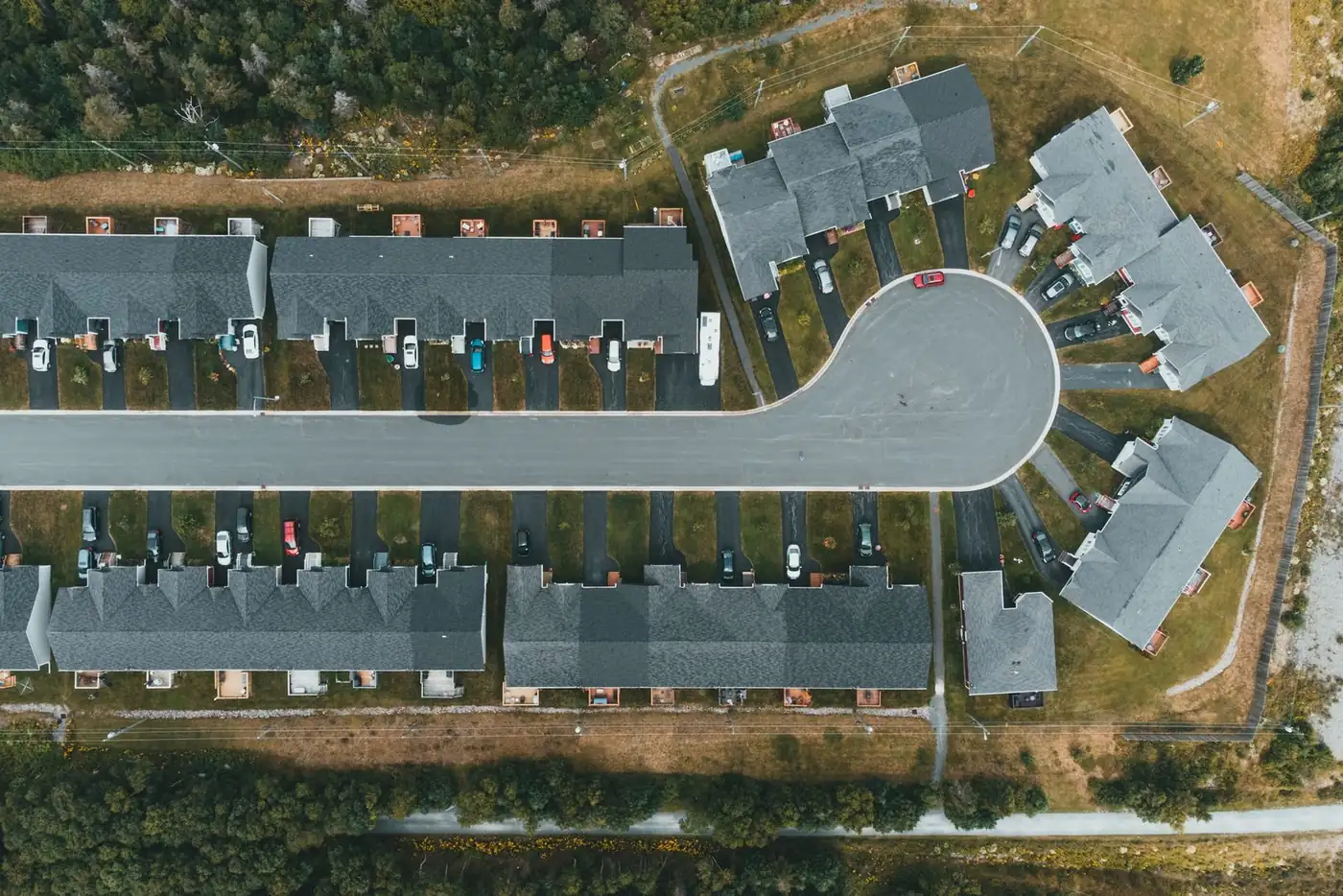 Aerial view of a cul-de-sac and townhome community streets