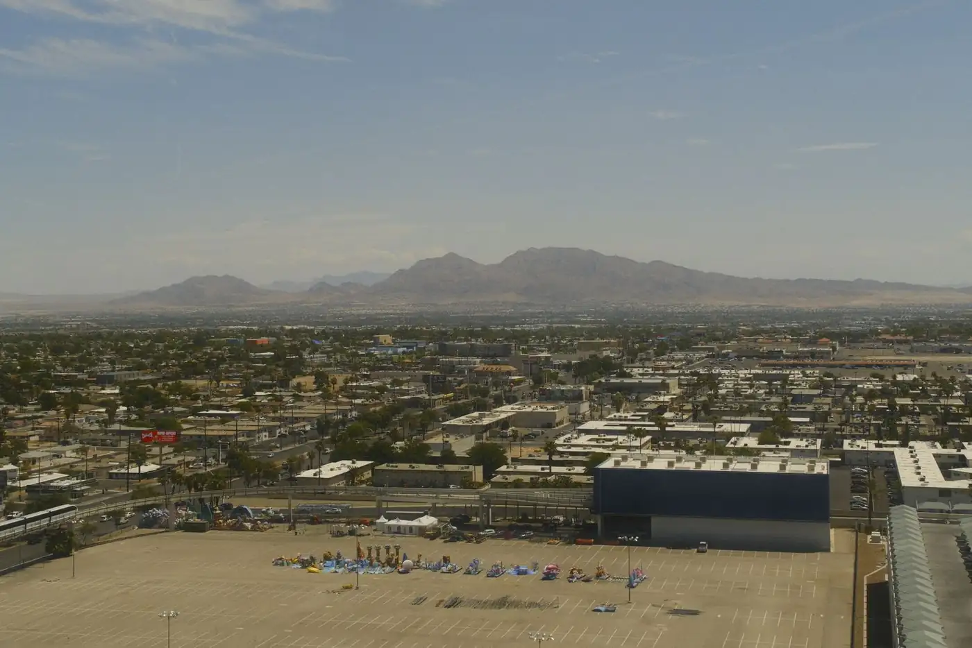 Wide view over Las Vegas Valley neighborhoods toward the mountains